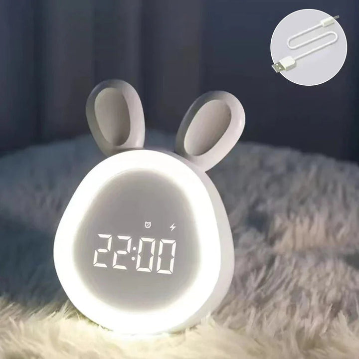 Süßer Hasen-Kinderwecker mit integriertem LED Nachtlicht, hilft Kindern beim Einschlafen und Aufwachen.