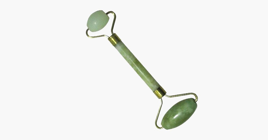 Grüner Jade-Gesichtsroller für eine revitalisierende Gesichtsmassage. Unterstützt die Hautpflege und -straffung.