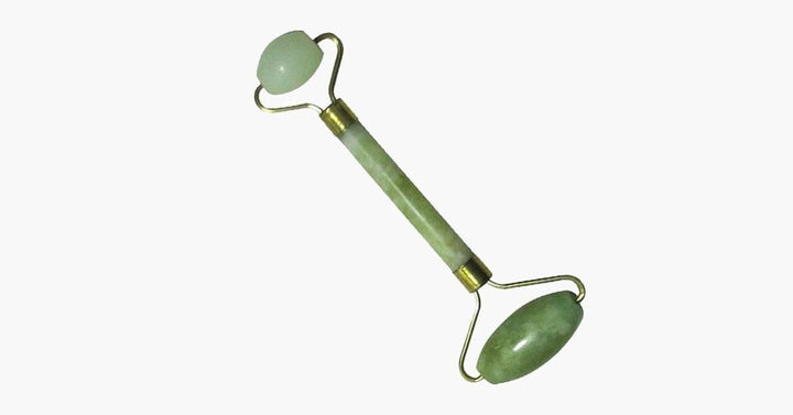Grüner Jade-Gesichtsroller für eine revitalisierende Gesichtsmassage. Unterstützt die Hautpflege und -straffung.