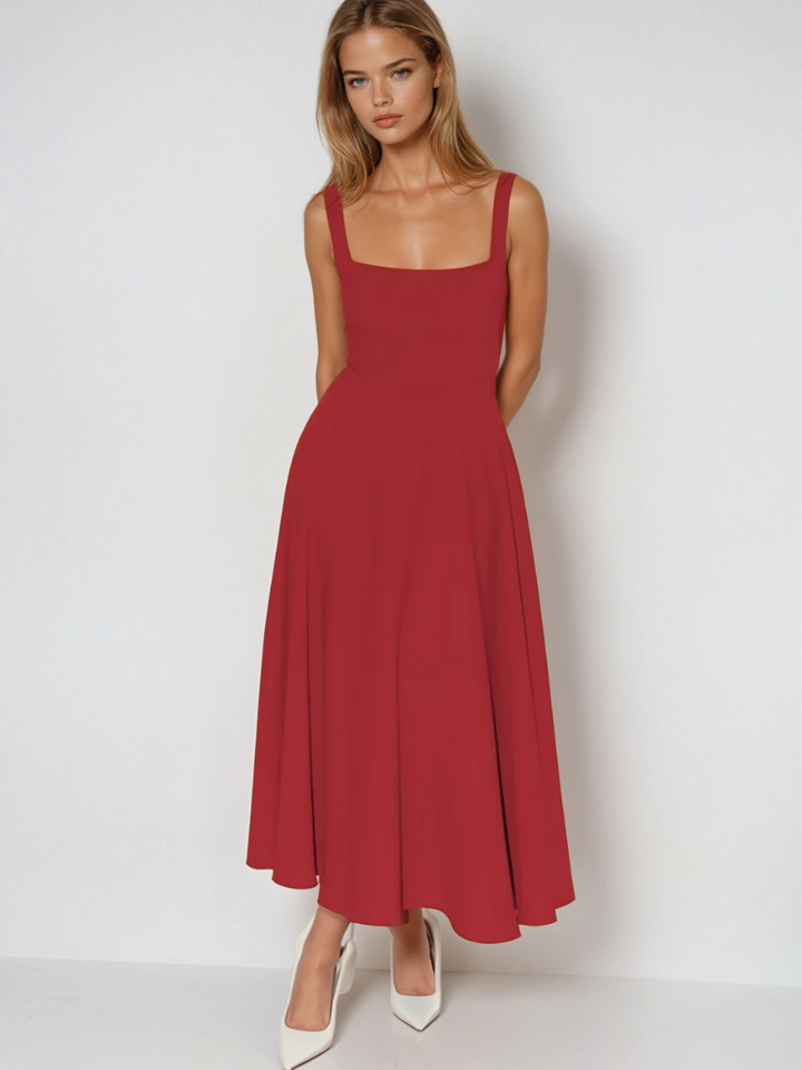 Weißes Midi-Kleid für Damen, feminines Design, perfekt als Sommer- oder Partykleid.