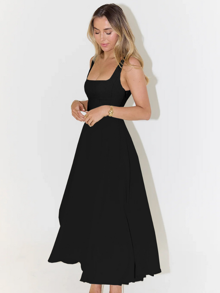 Weißes klassisches Midi-Kleid, luftiges Sommerkleid oder schicke festliche Mode für Frauen.