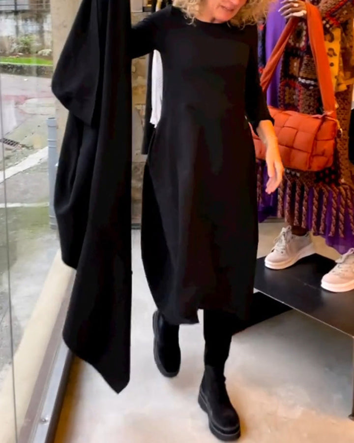 Klassisches schwarzes Midi-Kleid Sofia für Damen, elegante A-Linie mit langen Ärmeln und rundem Ausschnitt.