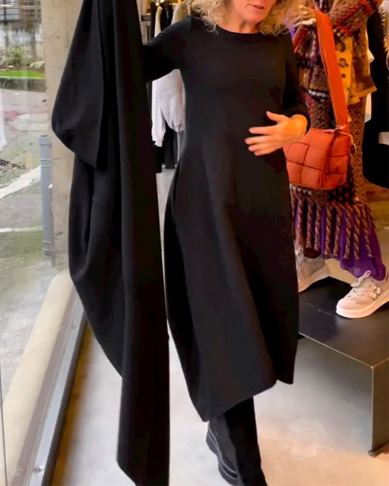 Vielseitiges schwarzes Midi-Kleid für Damen, ideal als Freizeit-, Herbst- oder Winterkleid, zeitlos elegant.