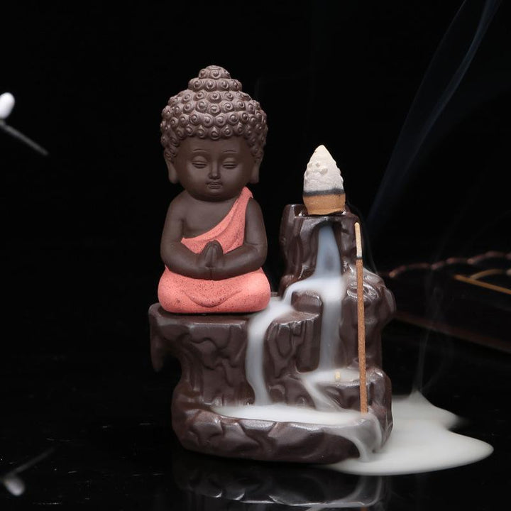 Stilvolles Rückfluss Räuchergefäß aus Keramik in Buddha-Form, ideal für Meditationsräume.