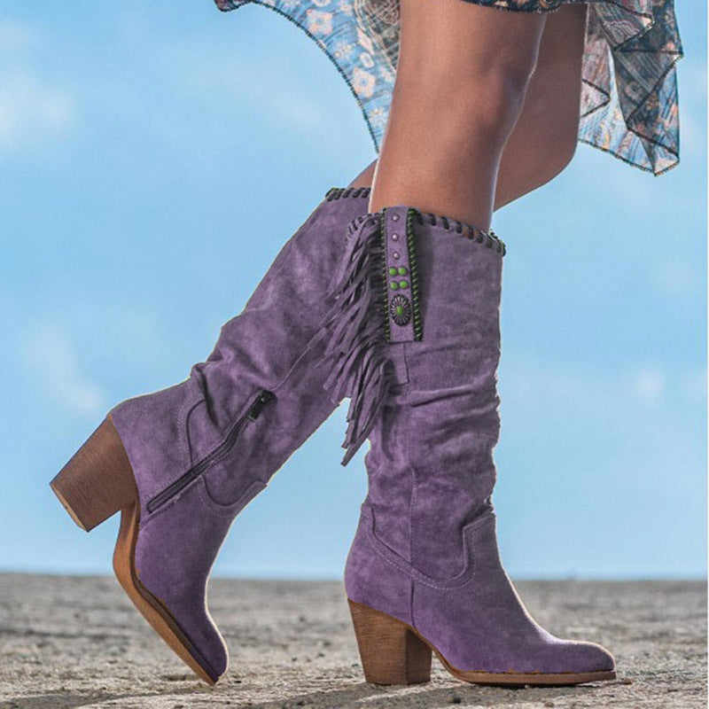 Elegante kniehohe Cowboystiefel für Damen mit bequemem Blockabsatz, ideal für einen stylischen Wildwest-Look.
