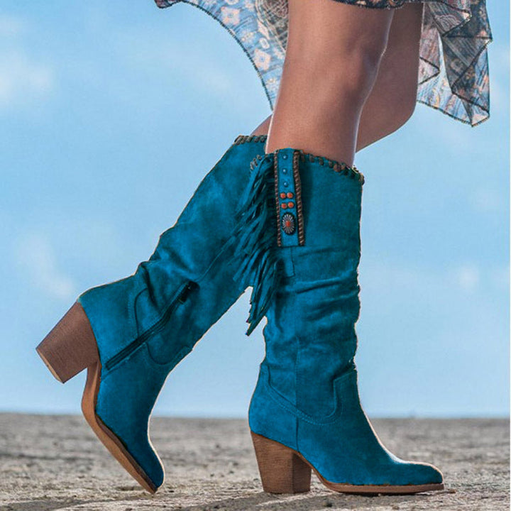 Lange Western Stiefel für Damen, kniehoch, mit zeitlosem Design und stabilem Absatz für optimalen Tragekomfort.