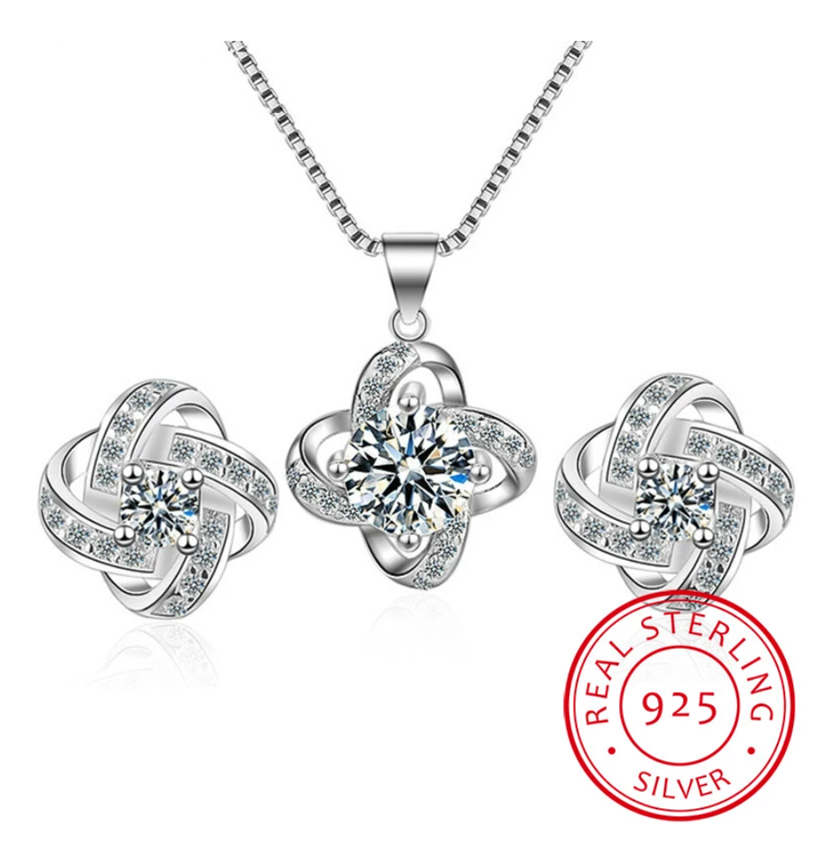 Funkelndes Liebesknoten Schmuckset: Halskette & Ohrringe mit Zirkonia, Weißgold-Optik für Damen.