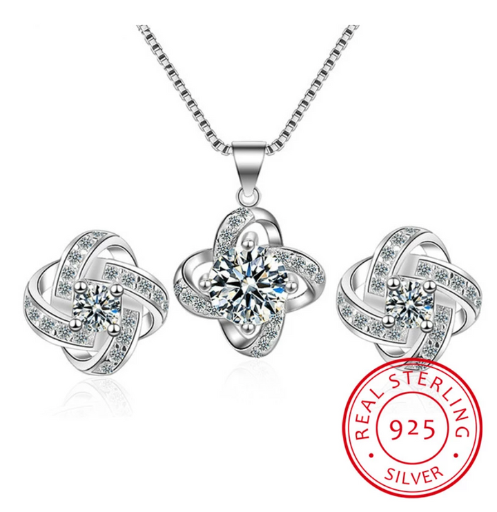 Funkelndes Liebesknoten Schmuckset: Halskette & Ohrringe mit Zirkonia, Weißgold-Optik für Damen.