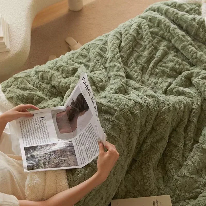 Flauschige Kuscheldecke aus weichem Material für optimalen Schlafkomfort und Gemütlichkeit im Schlafzimmer.