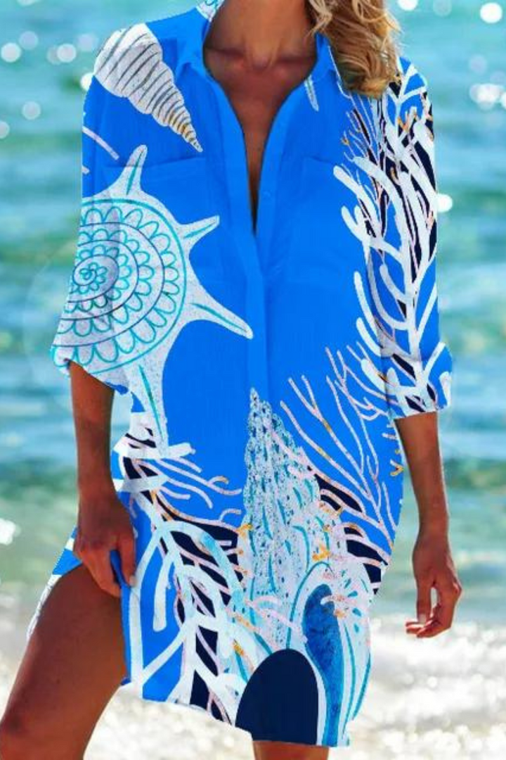 Lange Damen Strandbluse mit elegantem Meeresmotiv, locker geschnitten, perfekt als Sommerkleid für den Urlaub.