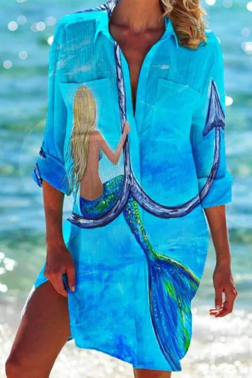 Stylische Damen Tunika mit Halbarm und feinem Meeresmotiv, ideal als lässiges Strandoutfit oder Freizeitkleid.