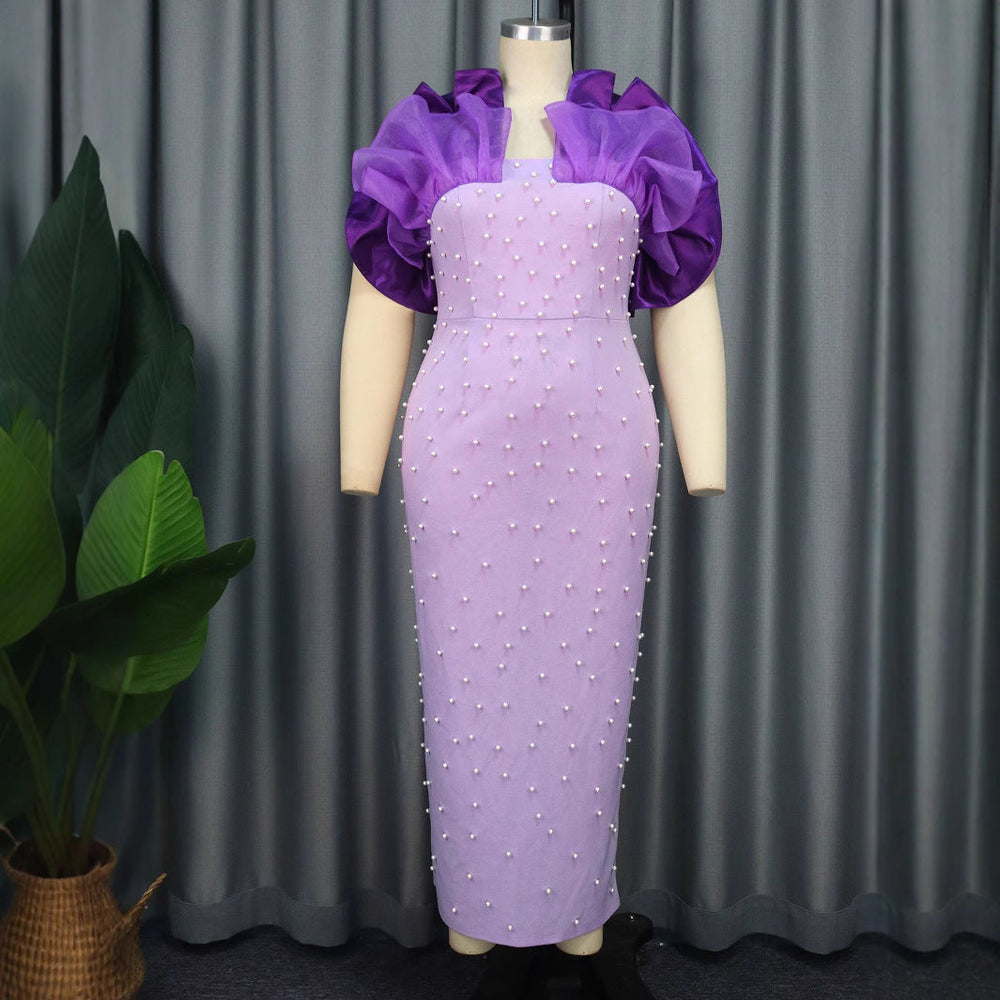 Figurbetontes lila Maxikleid für Damen, mit Puffärmeln & Perlenstickerei, ideal als festliches Partykleid.