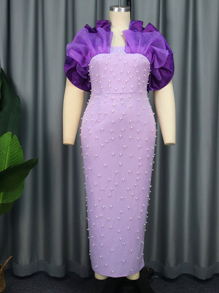 Luxuriöses lila Abendkleid für Damen, mit stilvollen Puffärmeln und glänzenden Perlen, ideal für Gala.