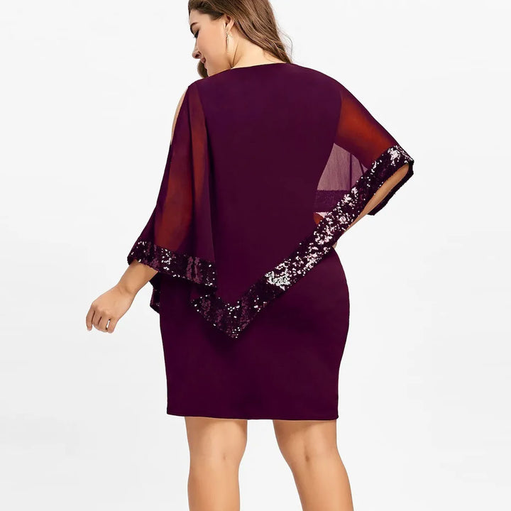 Abendkleid Pailletten Übergröße, fließender Stoff, betont die Figur auf schmeichelhafte Weise.