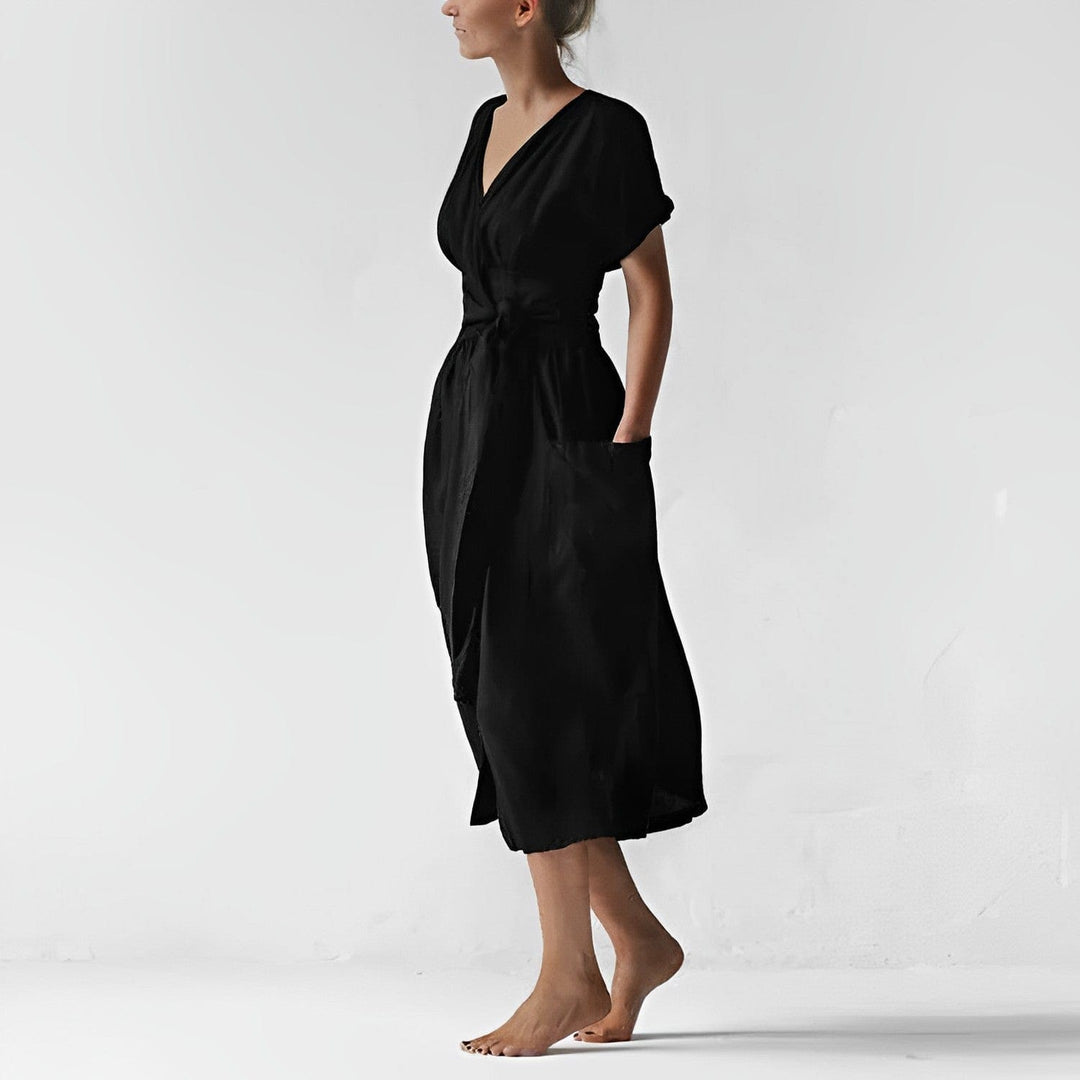 Damen Sommerkleid, Midilänge, mit V-Ausschnitt und Wickelgürtel. Feminines Design für Frühling & Sommer.