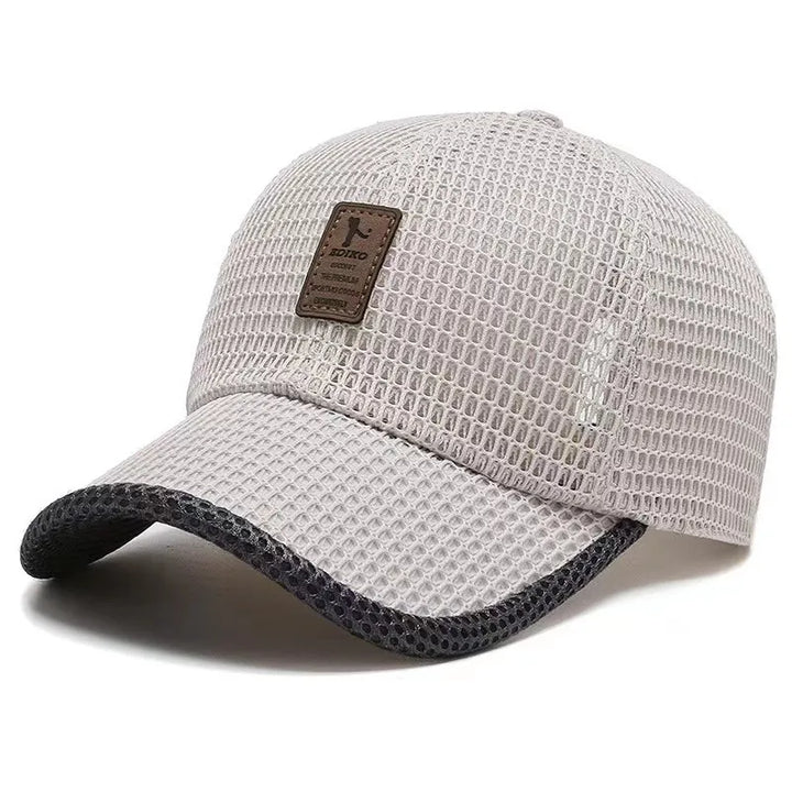 Graue, stilvolle Unisex Freizeitkappe, atmungsaktiv und verstellbar, vielseitig für jeden Tag.