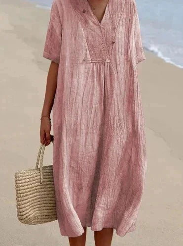 Fließendes Damen Sommerkleid mit V-Ausschnitt und A-Linie. Bequemes, luftiges Kleid, perfekt für den Sommerurlaub.