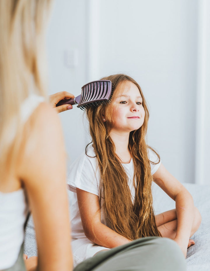 Anti-Tangle Haarbürste für schnelles Trocknen & schmerzfreies Entwirren, ideal für nasses Haar & Styling.
