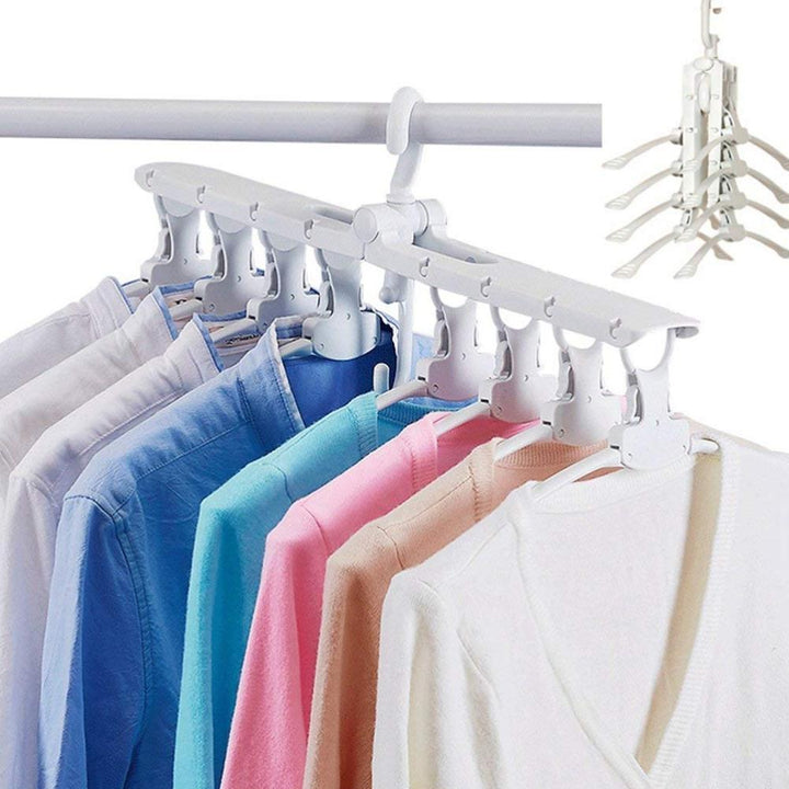 Magischer faltbarer Kleiderbügel in Grau, platzsparend für Schränke & Reisen, hält Kleidung knitterfrei.