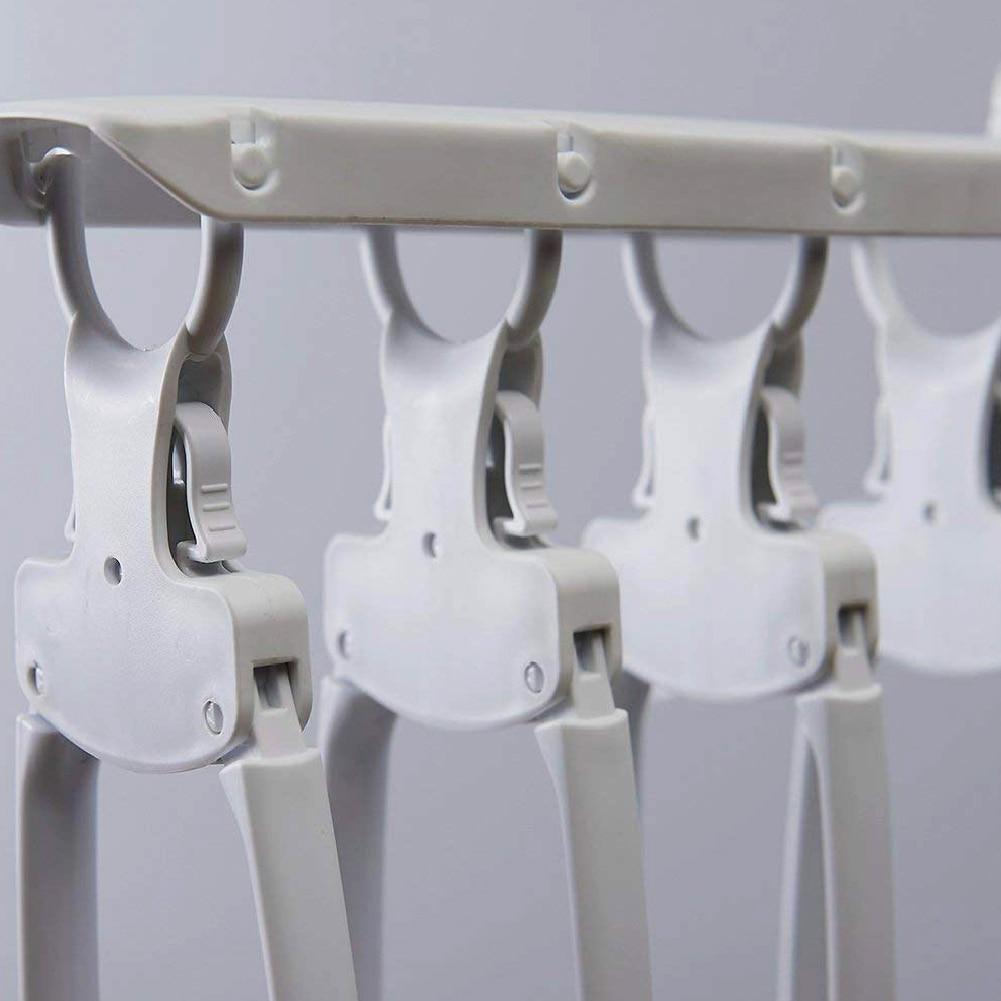 Robuster Kunststoff-Faltbügel in Anthrazit. Perfekt für platzsparende Kleideraufbewahrung & knitterfreie Garderobe.