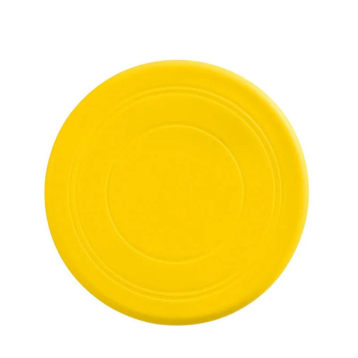 Langlebiges Silikon-Frisbee für Hunde, ideal für Apportierspiele im Freien; robust und sanft zu Zähnen.