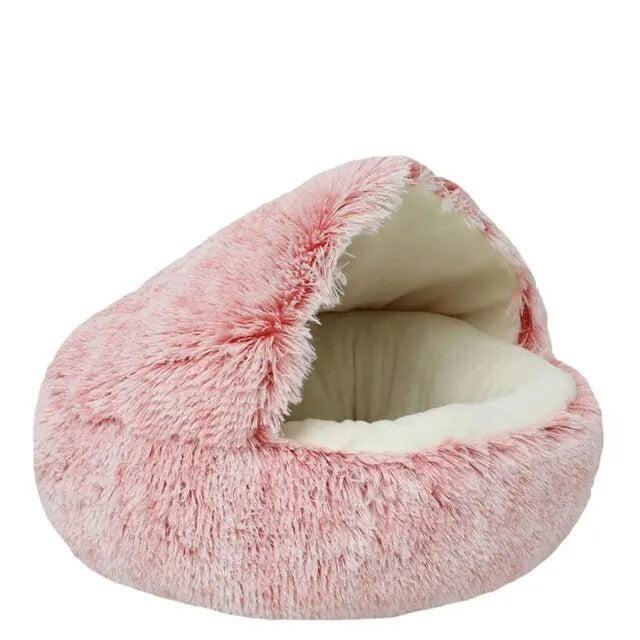 Komfortables, rundes Plüschbett, vielseitig als Kuschelhöhle oder offenes Katzenbett nutzbar.