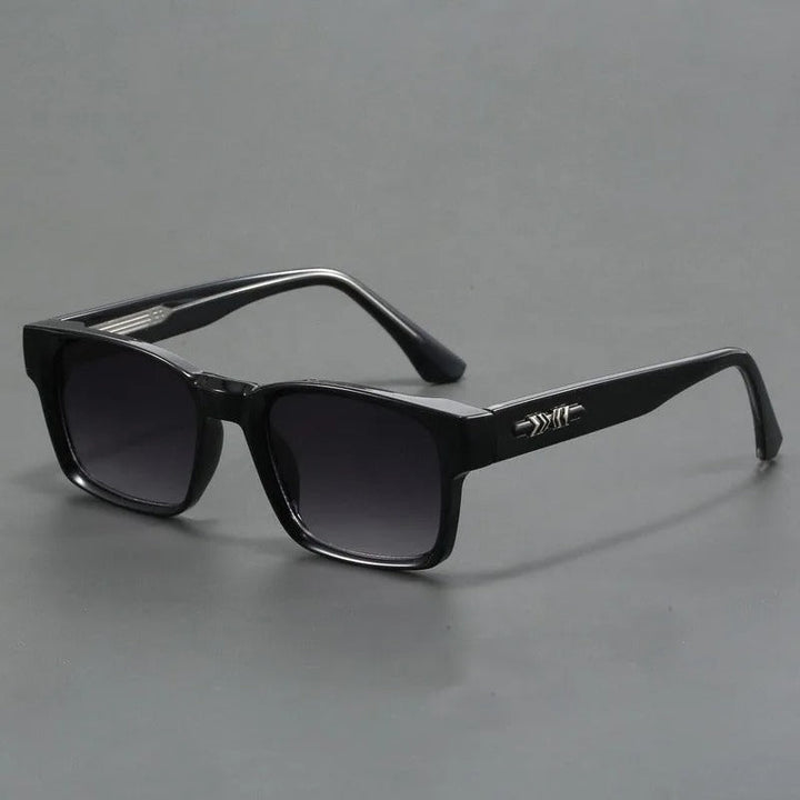 Hochwertige Herren Sonnenbrille mit kratzfesten Gläsern und UV400 Schutz im trendigen 90er Retro-Stil.