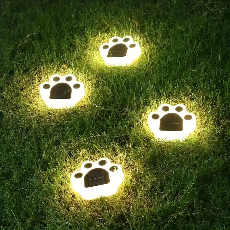 Solare Pfotenabdruck Gartenleuchte, wetterfest, als charmante Gartendeko für Tierliebhaber.