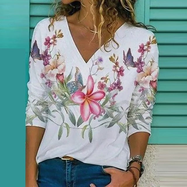 Komfortable Damen Sommer Bluse mit tiefem V-Ausschnitt. Luftiges und elegantes Oberteil für heiße Tage.