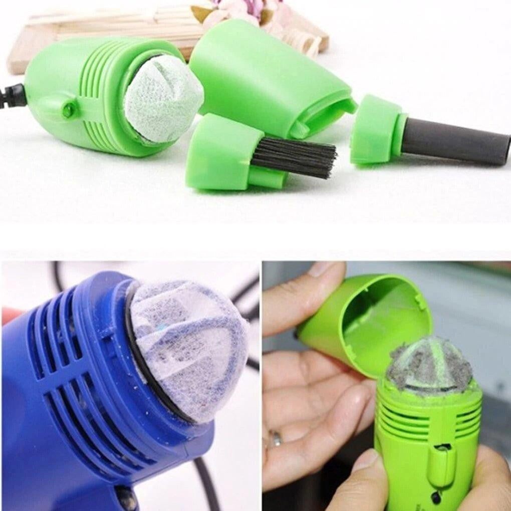 Kompakter Mini USB Staubsauger in der Hand. Tragbarer PC-Zubehör-Reiniger für Büro, Auto & Unterwegs.