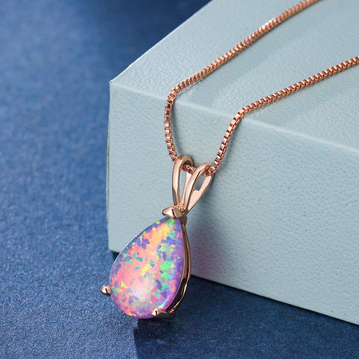 Damen-Schmuckstück: Elegante Opal-Tropfen-Halskette, zart und modern.