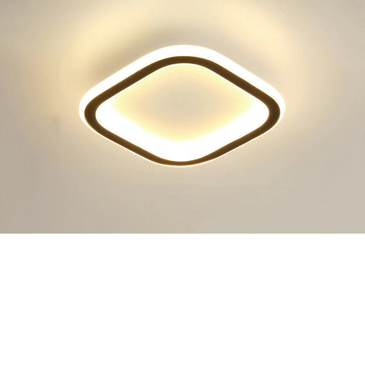 Installierte LED Flurlampe, dimmbar & modern, sorgt für helle und warme Eingangsbeleuchtung.