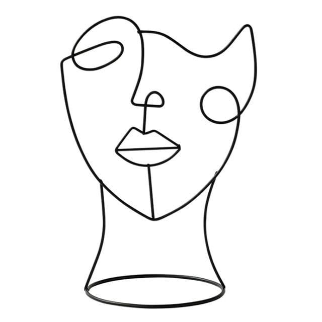 Moderne Eisen Gesichtsskulptur, abstraktes Design für einzigartige Heimdekoration.