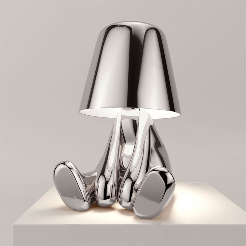 LumiSerene LED-Lampe, modernes Design, Stimmungslicht für gemütliche Abende, goldene oder silberne Ausführung.