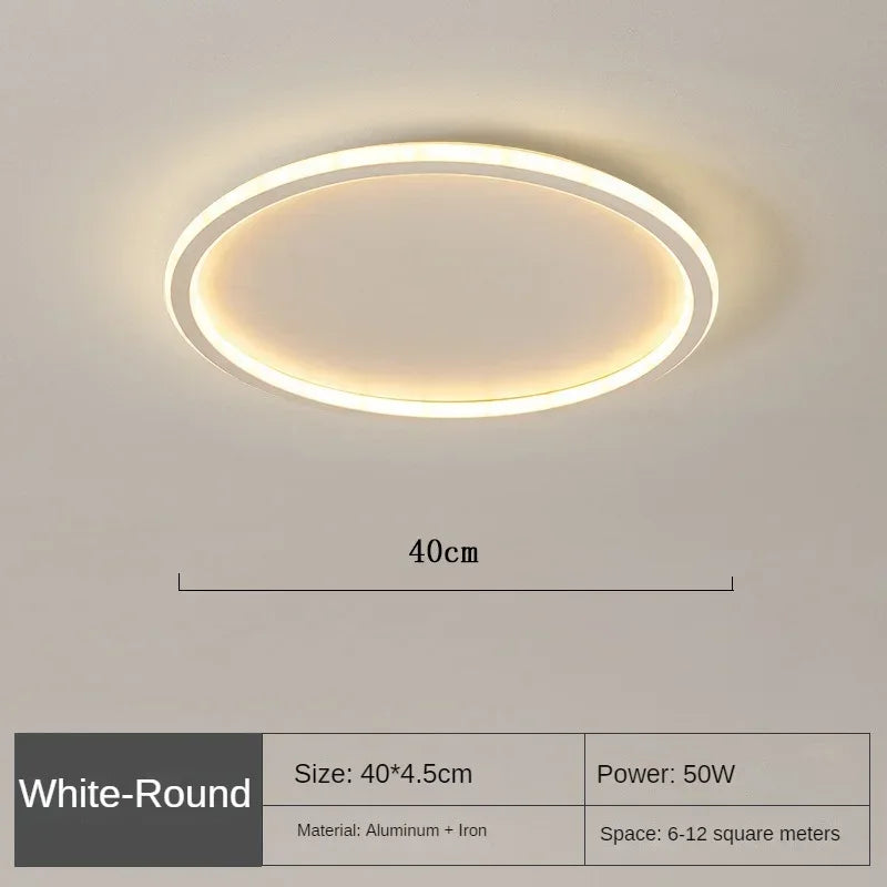 Helle, dimmbare runde LED Deckenleuchte, skandinavisch, schafft angenehme Atmosphäre im Raum.