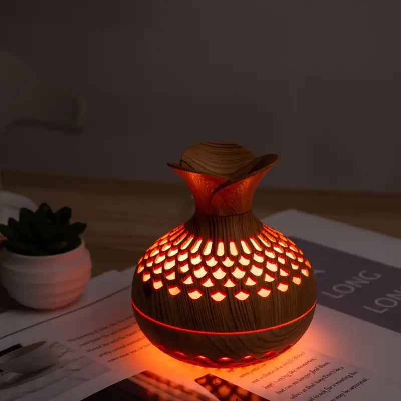 Stilvoller Aroma Diffuser mit modernem Design, perfekt für ätherische Öle, schafft entspannte Wohlfühlatmosphäre.