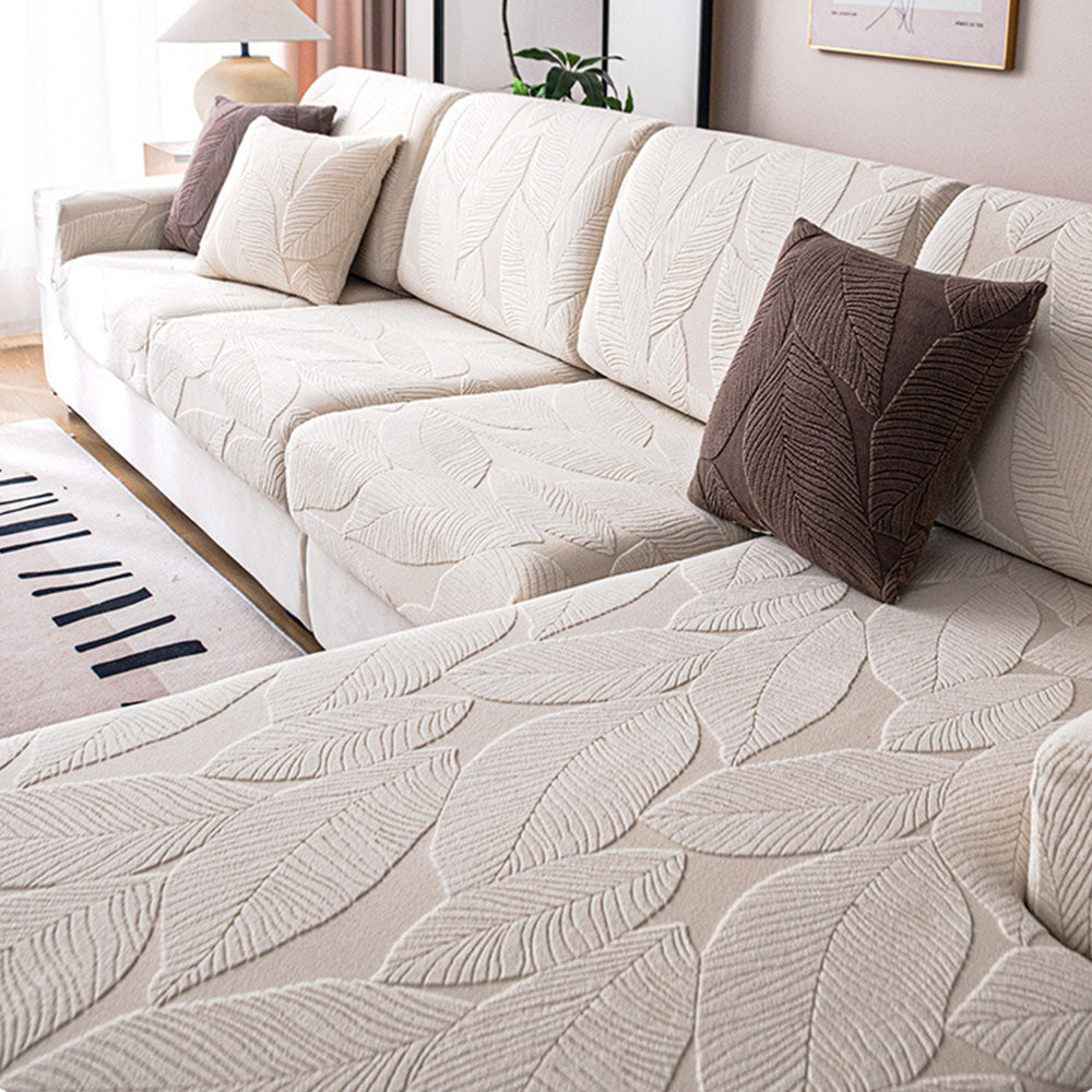 Moderner Jacquard Sofabezug mit Blättermuster. Wasserabweisend, kratzfest & elastisch.