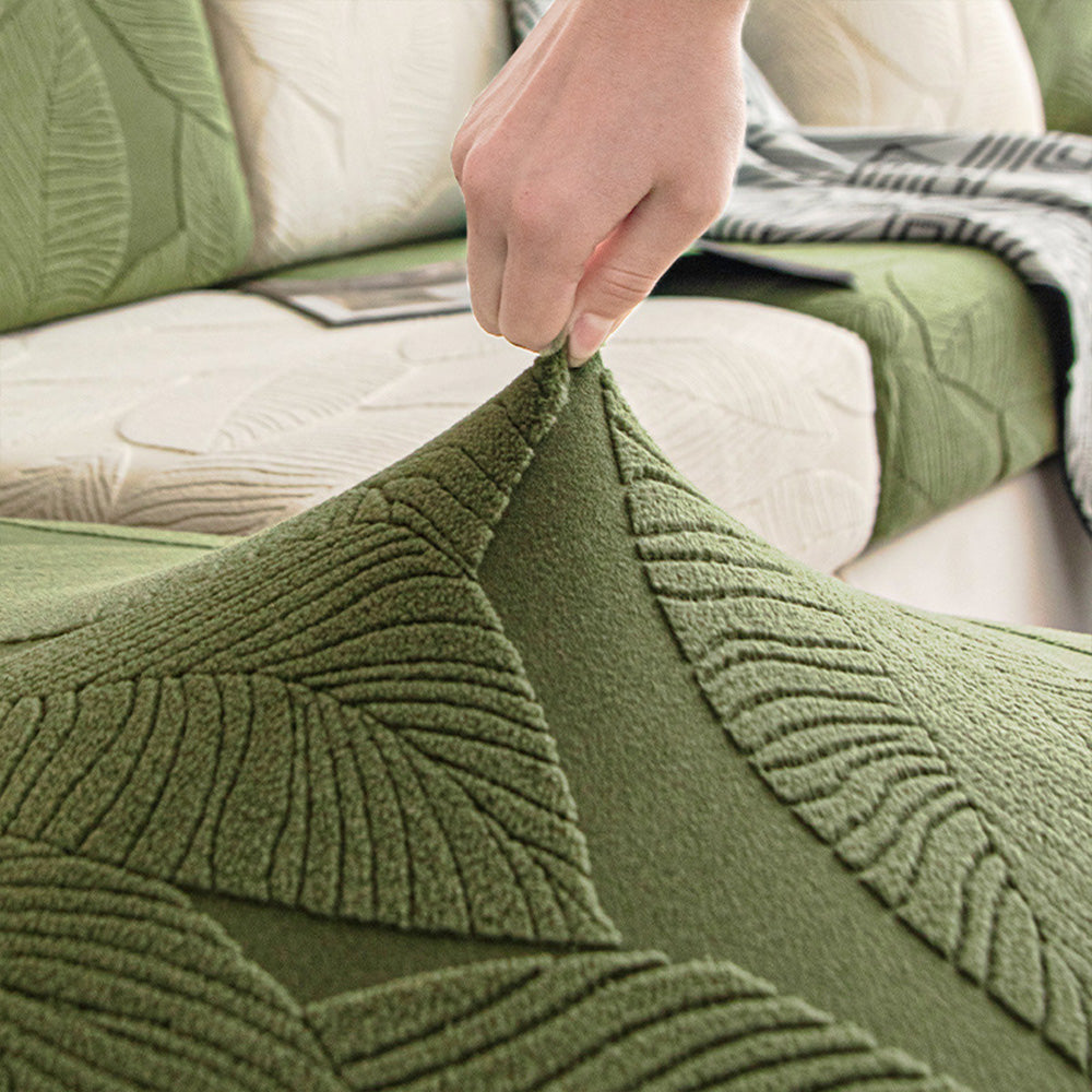 Nahaufnahme des modernen Jacquard Sofabezugs mit elegantem Blättermuster für stilvolles Wohndekor.