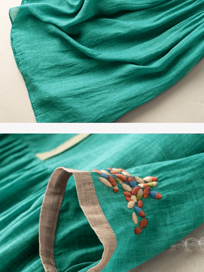 Vorderansicht des lockeren Damen Ethno-Kleides mit Stickereien. Rundhals-Sommerkleid im Boho-Stil.