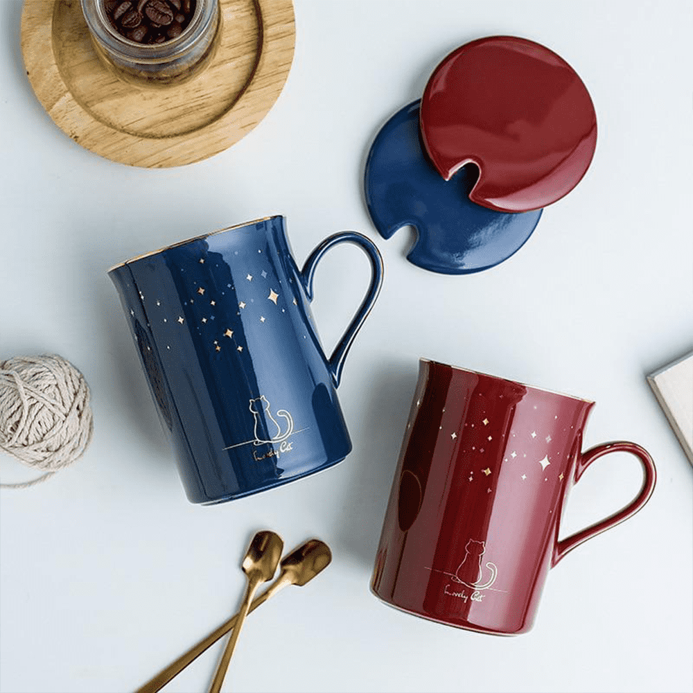 Charmante Teetasse aus Keramik mit Katzen-Design und Katzenschwanz-Henkel. Eine tolle Geschenkidee.
