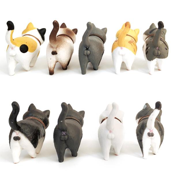 Detailreiche Miniatur Katzenfigur mit drehbarem Kopf, ideal als Dekoration & Sammlerstück.