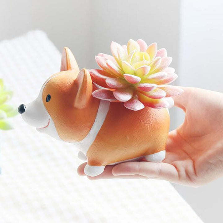 Handgeschnitztes Corgi Pflanzgefäß aus Harz für kleine Pflanzen; ideal als Wohnaccessoire oder Bürodekoration.