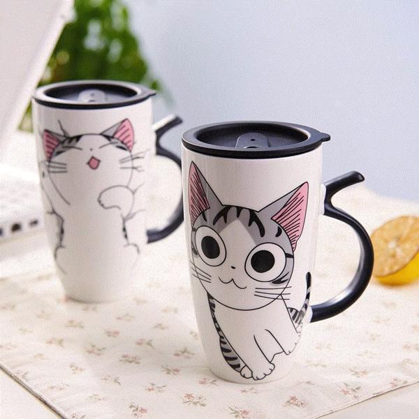 Kuscheliger Katzenbecher aus Keramik mit Deckel. Ein Muss für jeden Katzenfreund und Tierliebhaber.