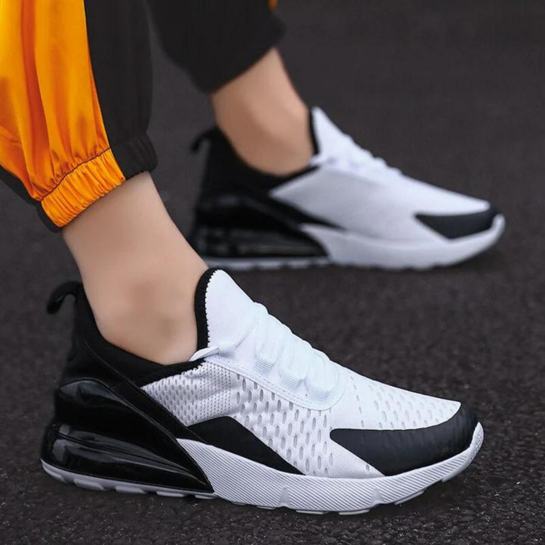 Nova Unisex-Sneakers in Schwarz-Weiß, bequem und modisch für Damen und Herren, ideal für Sport und Alltag.
