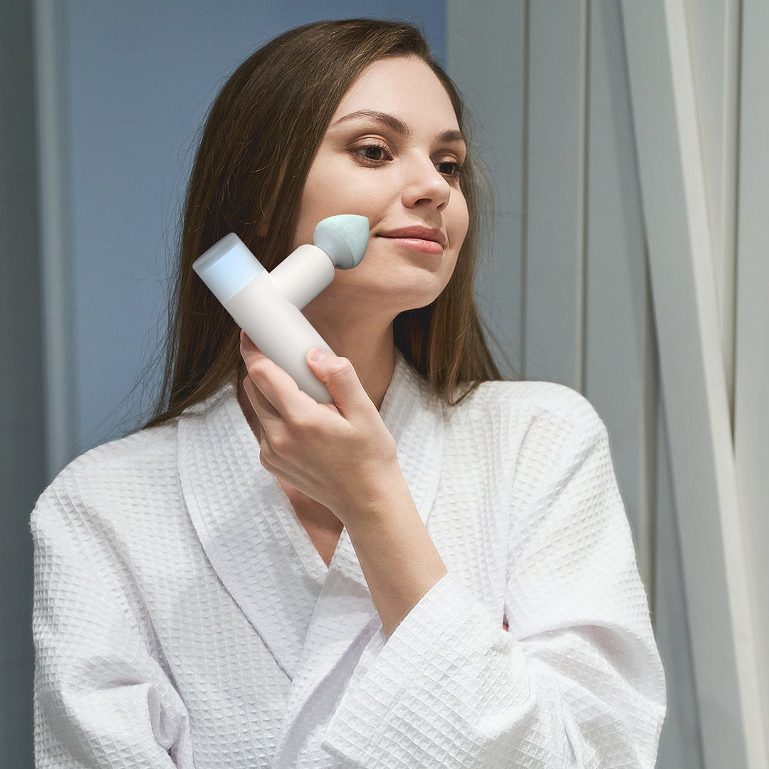 Handliche Mini-Massagepistole für tiefe Muskelentspannung und effektive Sportmassage.