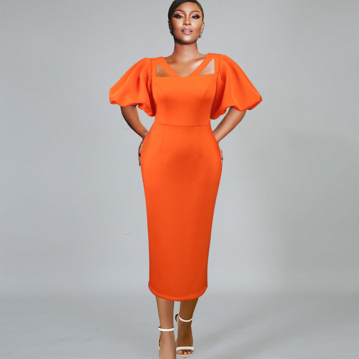 Orange, figurbetontes Damenkleid mit innovativen Puffärmeln; elegant für Abendmode & Partys.