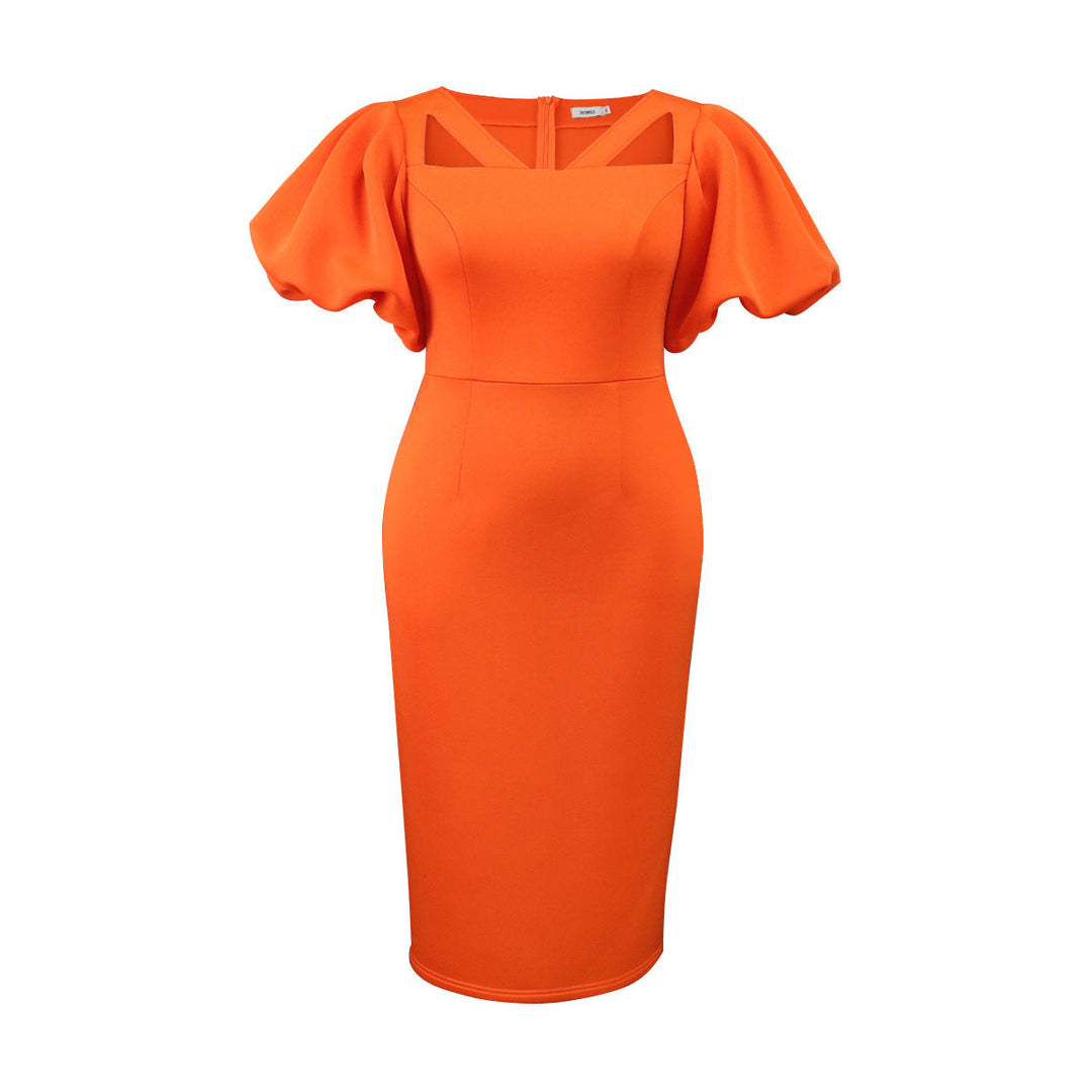 Detail: Innovative Puffärmel und der figurbetonte Schnitt dieses modernen Damenkleides in Orange betonen Eleganz.