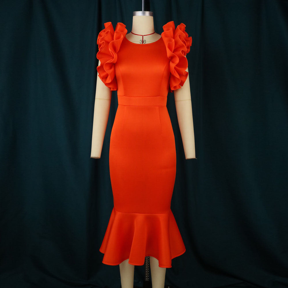 Glamouröses Damen Rüschenkleid in Orange. Figurbetontes Partykleid mit eleganten Details & schmeichelhaftem Schnitt.