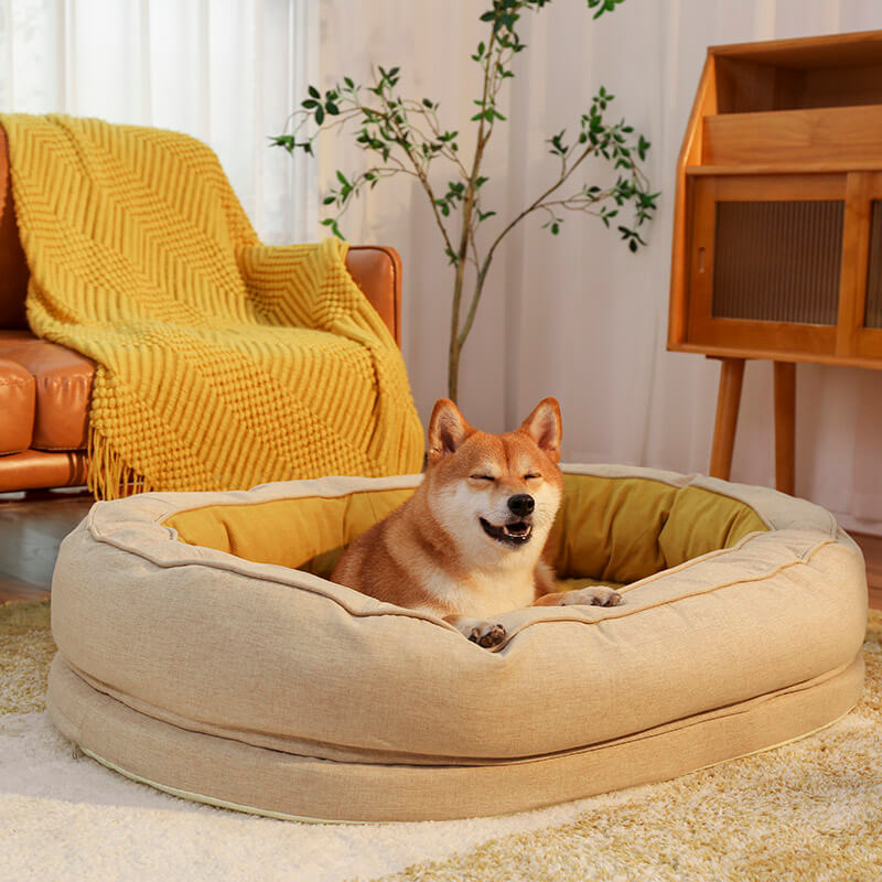 Gemütliches Donut-Hundebett für kleine Hunde, orthopädisch & waschbar.