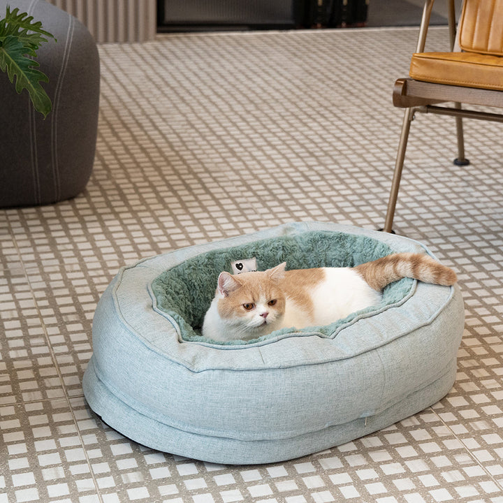 Orthopädisches Donut Hundebett, stützt Gelenke, ideal für ältere Hunde & Welpen.